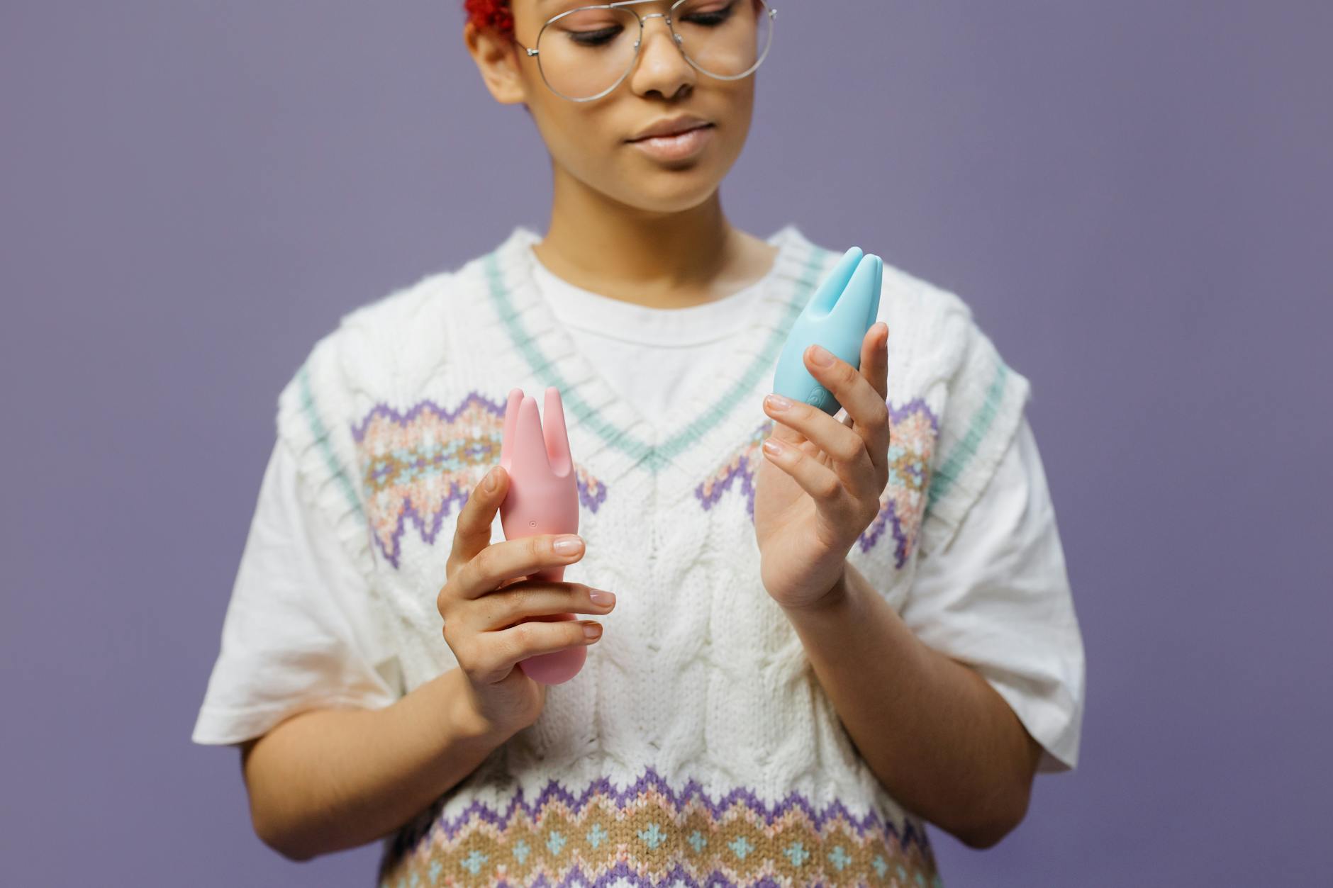 Woman exploring different lemon clitoral vibrators and stimulation options.