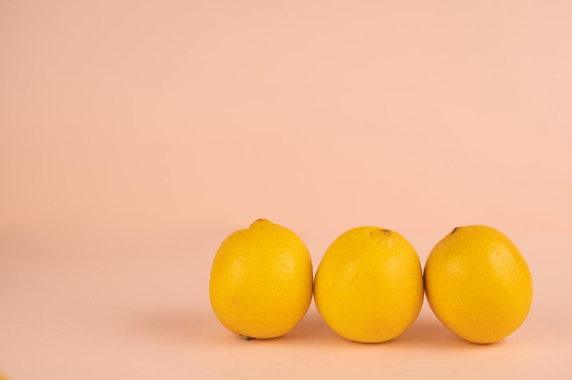 Colorful vibrators arranged on a bright yellow background representing diverse pleasure options